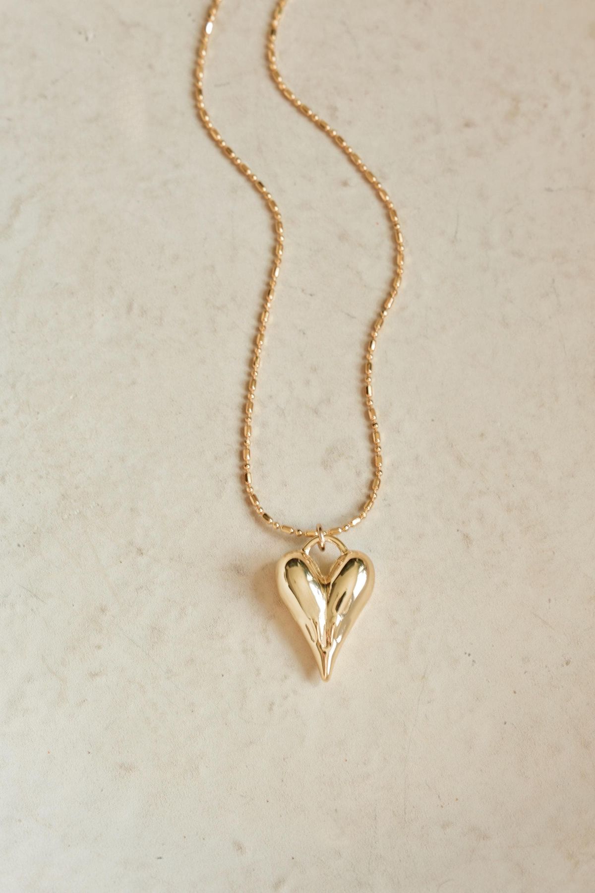 Melted heart pendant